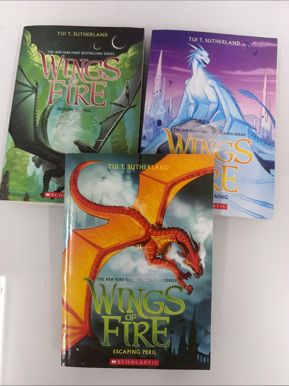 Wings of Fire Book Escaping Peril Tui T. Sutherland winter turning moon rising